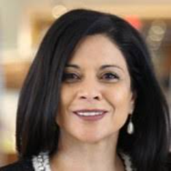 Photo of Andrea De Souza, Chief Corporate Development Officer, Qubit Pharmaceuticals