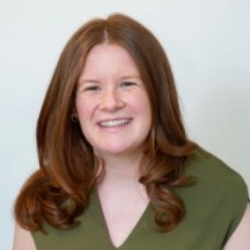 Photo of Claire Patterson, Senior Manager, Business Development, Amgen