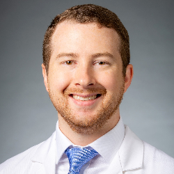 Photo of Neil Pfister, MD, PhD, Chief Medical Officer, Research Division, Numenos